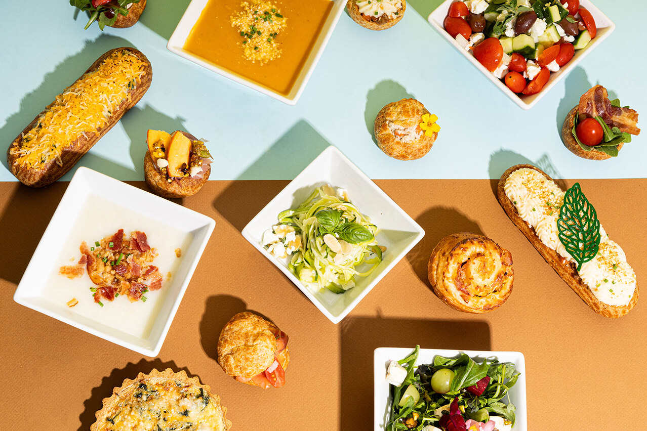 Full menu spread — éclairs, cream puffs, salads, and brunch at Éclair Affaire