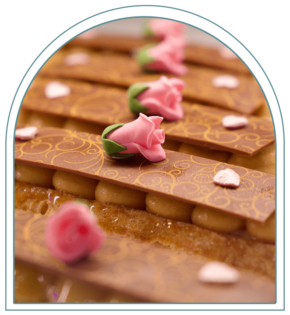 Rose-decorated chocolate éclairs — Éclair Affaire Weston signature